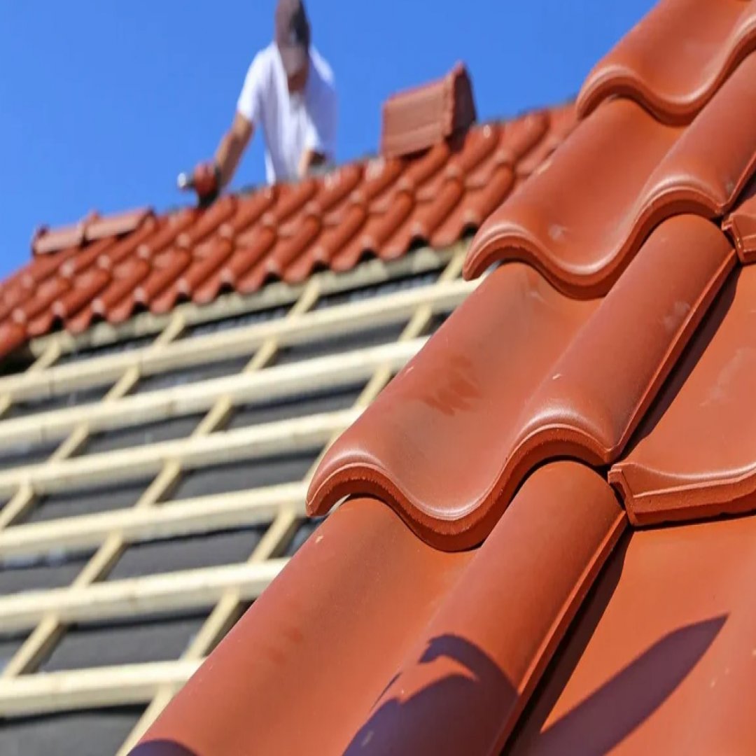 toiture en tuiles noir LJ TOITURE